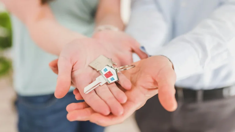 house key on the couples hand