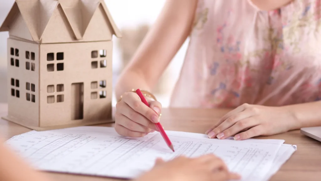 A student engaged in a discussion with a mortgage advisor